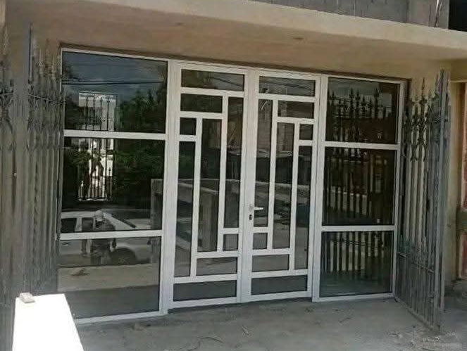 Marqueteria de aluminio y cristal