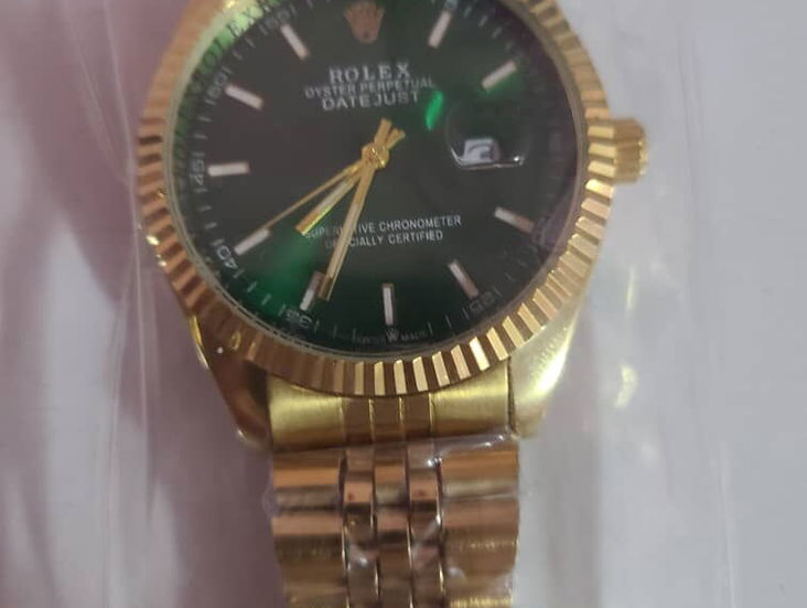 Reloj Rolex de cara verde
